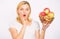 Girl hold basket apples white background. Metabolism and dieting. Healthy nutrition concept. Woman know how stay in