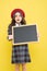 Girl hold blank blackboard. Advertising product copy space. Back to school concept. School information. Informing you