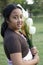 Girl hold bouquet of tulip flowers standing in ther garden