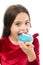 Girl hold glazed donut white background. Kid girl hungry for sweet donut. Donut become so popular. Sugar levels and