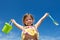 Girl holding bucket and spade