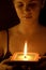 Girl holding candle