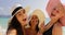 Girl Holding Cell Smart Phone Welcome Women To Take Selfie Photo On Beach, Cheerful Tourists In Straw Hats On Summer