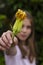 Girl holding courgette flower