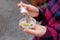 Girl holding cup with oysters