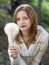 Girl holding a giant dandelion