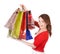 Girl holding group shopping bag.