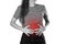 Girl holding her stomach. Abdominal pain. Close up. Isolated on