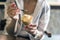 Girl holding ice cream, hands holding ice cream, eating ice cream.