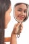 Girl holding mirror