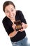 Girl holding old antique treasure chest with gold coins