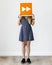 Girl holding orange forward icon sound playlist