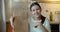 Girl holding paper bag with recycle sign and smiling. Care about environment