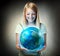 Girl holding the Planet Earth