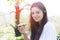 Girl holding rye bread with beetroot cream