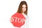 Girl holding stop sign