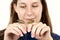 Girl holding two Oregon tree frogs