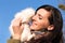 Girl holding a white little rabbit