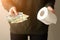 Girl holds euro banknotes and toilet roll. close-up