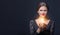 Girl holds glowing bulb in her hands-