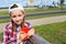 Girl holds red prayer book