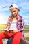 Girl holds red prayer book