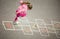 Girl on the hopscotch