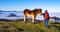 Girl with a horse in the Basque mountains