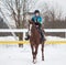 Girl on Horse in Winter Snow