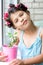 Girl with houseplant in pink pot