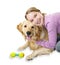 Girl hugging golden retriever dog