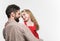 Girl hugging her father over a white background