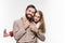 Girl hugging her father over a white background