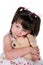 Girl hugging stuffed animal