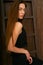 Girl, human, girl on a wooden background, lean girl, girl model, beautiful girl, girl from ukraine, girl near a wooden staircase