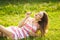 Girl inflating soap-bubbles