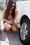 Girl Inflating Tire