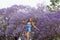 Girl and Jacaranda Tree