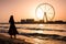 Girl on the JBR beach with Ain Dubai ferris wheel