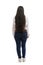 Girl in jeans and a white shirt with long hair. Back view. Full height. Eared on a white background. Vertical