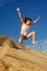 Girl jumping on beach