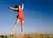 Girl jumping on a dune-1