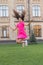 Girl jumping outdoors. Feel free. Jump of happiness. Small girl jump on green grass. Full of energy. Active girl feel