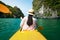 Girl kayaking on seaside of Halong bay in Vietnam