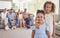 Girl, kids and smile in home living room on holiday together with parents blurred in family portrait. Friends, cousin