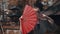 Girl in kimono with red hand fan