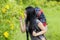 Girl kissing flower in the forest