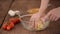 A girl kneading shortbread in glass bowl.