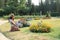 Girl kneeing in front of flowers