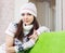 Girl in knitted hat relaxing at home